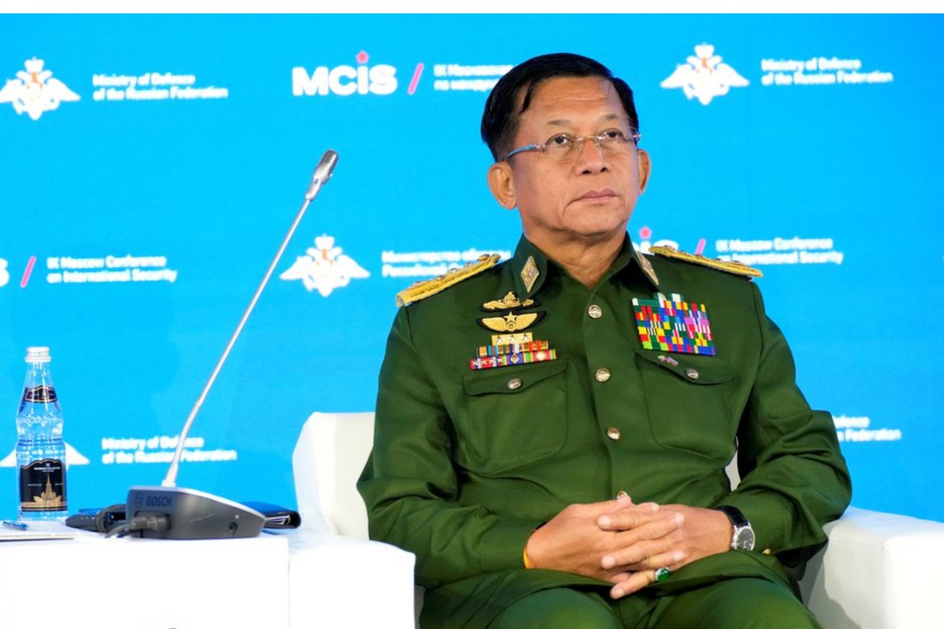 (အာဏာသိမ်းခေါင်းဆောင် ဗိုလ်ချုပ်မှူးကြီးမင်းအောင်လှိုင် ဇွန်လအတွင်းက ရုရှားနိုင်ငံ မော်စကိုမြို့၌ ကျင်းပသော လုံခြုံရေးဆိုင်ရာညီလာခံ တက်ရောက်ခဲ့စဉ်။ ဓာတ်ပုံ - Reuters)