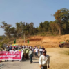 (ဗန်းမောက်မြို့တွင် ဌာနပေါင်းစုံပါဝင်သည့် စစ်အာဏာရှင်ဆန့်ကျင်ရေး လူထုလှုပ်ရှားမှုကို ၂၀၂၁ ဖေဖော်ဝါရီလ ၁၁ ရက် နံနက်ပိုင်းက ပြုလုပ်နေစဥ်၊ ဓာတ်ပုံ - CJ)