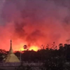 ငတရော်ကျေးရွာအား အကြမ်းဖက်စစ်တပ်က မီးရှို့ဖျက်ဆီးနေစဥ်။ ဓာတ်ပုံ-Cj
