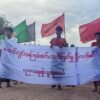 ဗကသရဲဘော်များနှင့် မြိုင်မြို့နယ်အခြေခံပညာသပိတ်ကော်မတီတို့ ဆန္ဒပြကန့်ကွက်ေနသည်ကို သြဂုတ်၁၈ရက်က ေတွ့ရစဥ်၊ ဓာတ်ပုံ - aamij