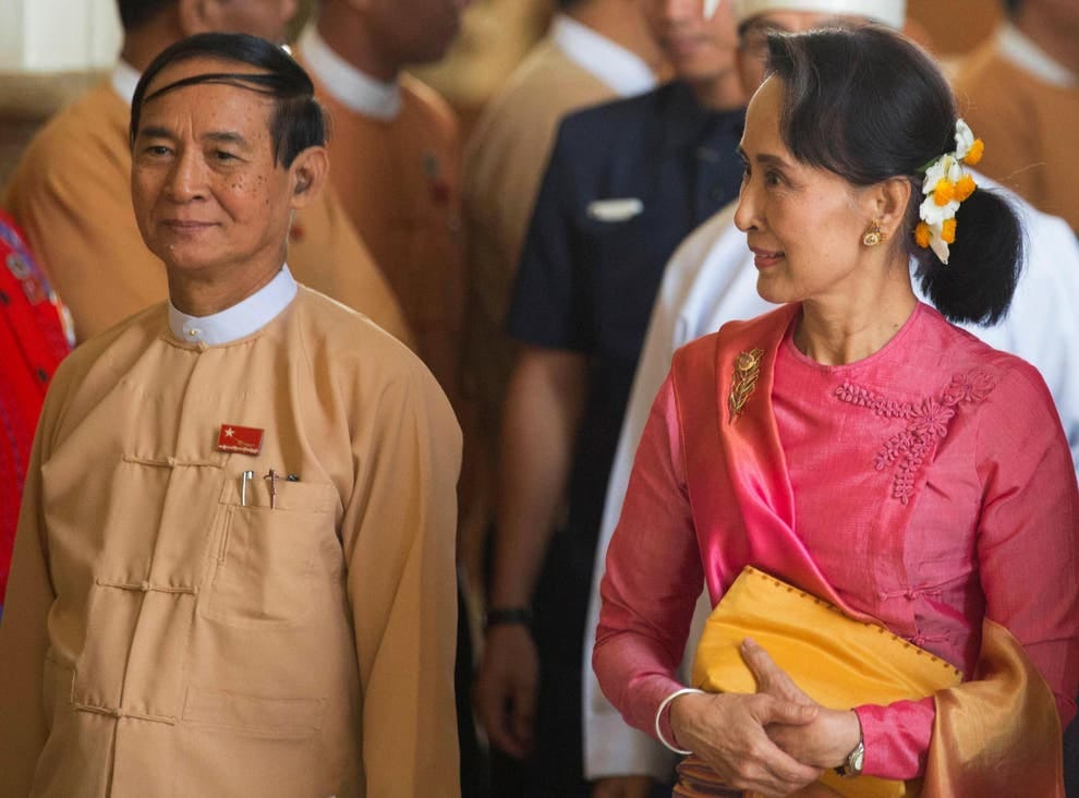 နိုင်ငံတာ်၏ အတိုင်ပင်ခံပုဂ္ဂိုလ်ဒေါ်အောင်ဆန်းစုကြည် နှင့် နိုင်ငံတော်သမ္မတ ဦးဝင်းမြင့် ။ ။ဓါတ်ပုံ-ရိုက်တာ