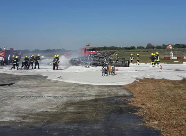 (မင်္ဂလာဒုံလေတပ်စခန်းဌာနချုပ်၌ F-7 လေယာဉ်တစ်စီးကို စက်နှိုးစမ်းသပ်ရာ အင်ဂျင်မှတစ်ဆင့် စတင်မီးလောင်ကျွမ်းမှုဖြစ်သည်ကို ယခင်နှစ်က တွေ့ရစဉ်၊ ဓာတ်ပုံ - CJ)