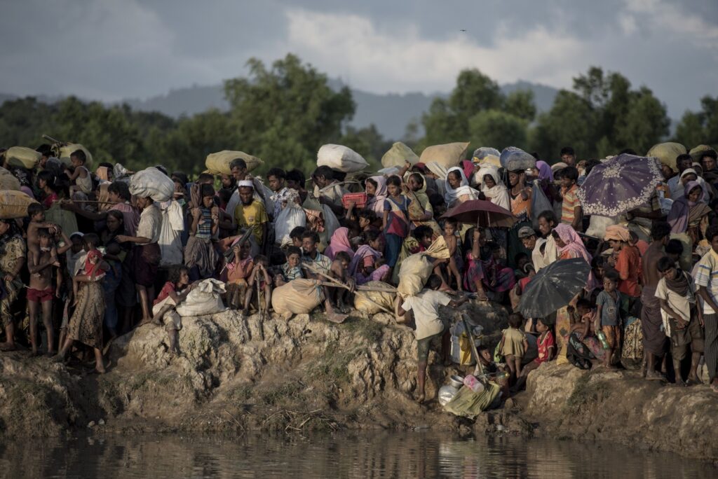 Rohingya refugees wait after crossing the Naf River from Myanmar into Bangladesh in 2017. Photographer Fred Dufour AFP Getty Images