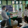 (လူမူဖူလုံရေး ထောက်ပံ့ကြေးငွေပေးအပ်နေစဥ်၊ ဓာတ်ပုံ - CJ)