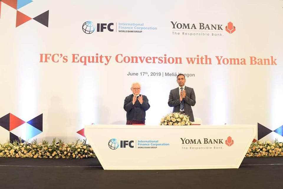 (၂၀၁၉ ခုနှစ်တွင် IFC နှင့် ရိုးမဘဏ်တို့သဘောတူလက်မှတ်ရေးထိုးခဲ့စဥ်။ ။ဓါတ်ပုံ-ရိုးမဘဏ်)