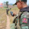 (KRUတပ်ဖွဲ့ဝင်အချို့နှင့် တိုက်ပွဲတွင်မ​ပေါက်ကွဲ​သေး​သောလက်နက်ကျည်အစိတ်အပိုင်းတစ်ခု။ ဓါတ်ပုံ-KRU)