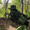 (ကရင်နီအမျိုးသားများကာကွယ်ရေးတပ်(KNDF)တပ်ရင်း - ၁၄ မှ ရဲဘော်တစ်ဦး စနိုက်ပါဖြင့် ပစ်ခတ်နေစဥ်။ ဓာတ်ပုံ - KNDF-B14)