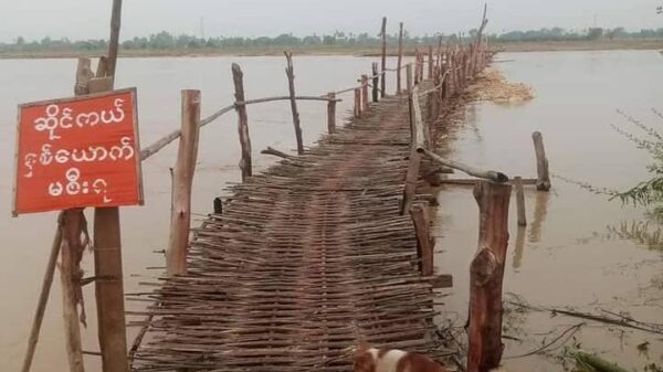 (ခင်ဦးနှင့် ရေဦးနယ်သို့ ဆက်သွယ်ထားသောပျက်စီးသွားသည့် ကိုယ်ထူကိုယ်ထတံတားအား တွေ့ရစဥ်နှင့် ပုလဲနယ်အတွင်း မိုခါမုန်တိုင်းကြောင့် ပျက်စီးဆုံးရှုံးမှုများအား တွေ့ရစဥ်။ ဓာတ်ပုံ - Pale Entertainment၊ KDK)