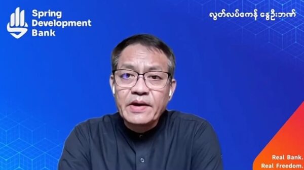 (အမျိုးသားညီညွတ်ရေးအစိုးရ(NUG) စီမံကိန်း၊ဘဏ္ဍာရေးနှင့်ရင်းနှီးမြှပ်နှံမှုဝန်ကြီး ဦးတင့်ထွန်းနိုင် ကို ဇူလိုင် ၂၀ ရက် ​နွေဦးဖွံ့ဖြိုး​ရေးဘဏ်သတင်းစာရှင်းလင်းပွဲတွင်​တွေ့ရစဥ်)