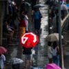 (ယနေ့ကျရောက်သော ရှစ်လေးလုံးအရေးတော်ပုံ (၃၅)နှစ်မြောက်အထိမ်းအမှတ်အနေဖြင့် ရန်ကုန်လူထုသပိတ်မှ လူငယ်များက စာတန်းပါထီးများဖြင့် ထီးအနီရောင်လှုပ်ရှားမှု ပြုလုပ်နေစဥ်။ ဓာတ်ပုံ - ရန်ကုန်လူထုသပိတ်)