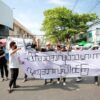 (ရန်ကုန်မြို့၊ ဗဟန်းမြို့နယ်၌ စမ်းချောင်းပင်မသပိတ်စစ်ကြောင်းမှဦးဆောင်ကာ Revolution Force ( RF)၊ LGBT community Yangon တို့မှ လူငယ်များ ပူးပေါင်းပါဝင်၍ ၂၀၂၂ မတ်လ ၂၀ ရက်က "သပိတ်ကအစ အလုပ်သမားက လူထုအားလုံးပါဝင်ကြ"စာတန်း ကိုင်ဆောင်ပြီး ဆန္ဒပြနေစဉ်။ ဓာတ်ပုံ - AAMIJ)