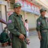 (ကိုးကန့်တပ်မတော် (MNDAA)မှ ရဲဘော်များ လောက်ကိုင်မြို့တနေရာ၌ လုံခြုံရေးယူနေစဥ်။ ဓာတ်ပုံ - အေပီ)