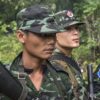 (ကရင်အမျိုးသား လွတ်မြောက်ရေး တပ်မတော်(KNLA)မှ ရဲဘော်များအား တွေ့ရစဥ်။ ဓာတ်ပုံ - Getty Images)