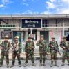 (နမ့်ခမ်းမြို့တရားရုံးရှေ့၌ လုံခြုံရေးယူနေသော TNLA တပ်သားများကို နိုဝင်ဘာအတွင်းက တွေ့ရစဉ်။ ဓာတ်ပုံ - TNLA)