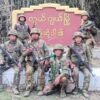 (လွယ်ဂျယ်မြို့ ဆိုင်းဘုတ်နှင့် KIA တပ်ဖွဲ့ဝင်များ။ဓါတ်ပုံ-​​ပေးပို့)